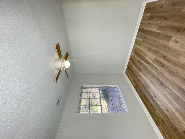 unfurnished room featuring ceiling fan