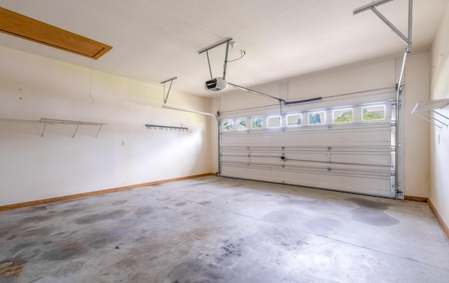 7812 Spring Creek Rd, North Charleston, SC 29418 - garage with a garage door opener and baseboards