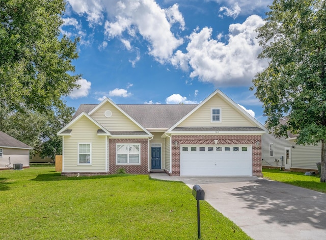 7812 Spring Creek Rd, North Charleston, SC 29418 - view of front of property featuring brick siding, driveway, a front lawn, and a garage