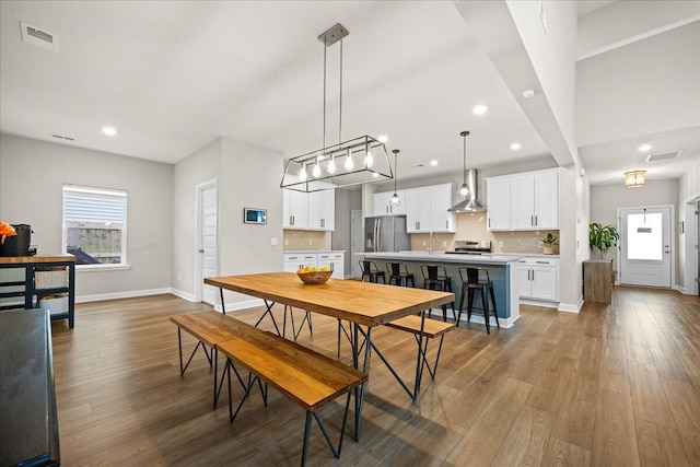 217 Lucca Dr, Summerville, SC 29486 - dining area featuring light wood-style floors, visible vents, baseboards, and recessed lighting