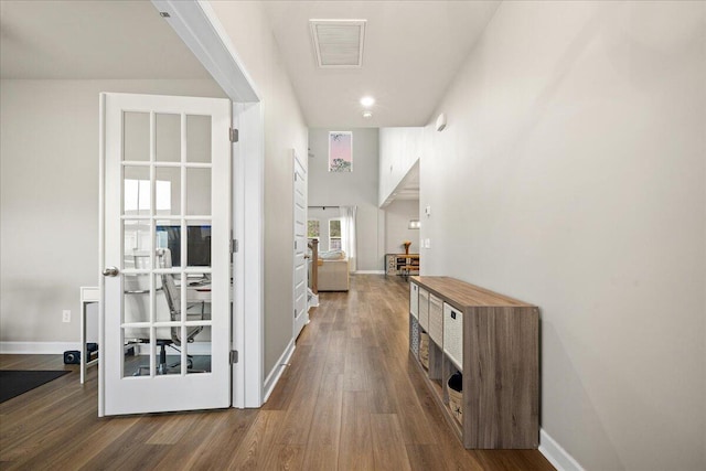 217 Lucca Dr, Summerville, SC 29486 - corridor featuring wood finished floors, visible vents, and baseboards