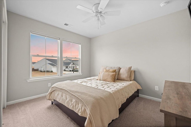 217 Lucca Dr, Summerville, SC 29486 - bedroom with carpet floors, baseboards, visible vents, and a ceiling fan