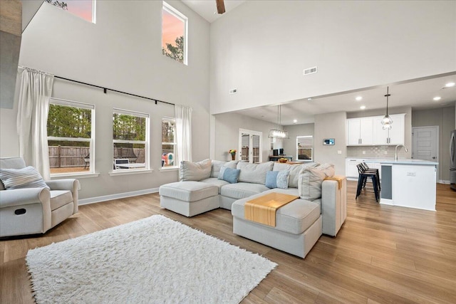 217 Lucca Dr, Summerville, SC 29486 - living room with light wood-type flooring, baseboards, visible vents, and recessed lighting