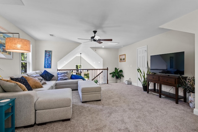 carpeted living area featuring visible vents, baseboards, and ceiling fan