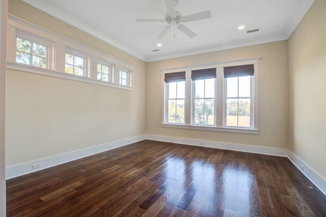 unfurnished room with dark wood-type flooring, crown molding, and ceiling fan