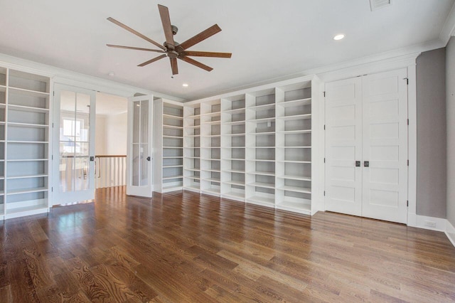 empty room with french doors, ceiling fan, ornamental molding, and hardwood / wood-style floors