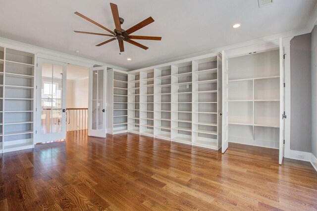 interior space with french doors, hardwood / wood-style flooring, and ceiling fan