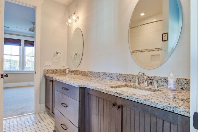 bathroom featuring vanity, tile patterned flooring, and ceiling fan