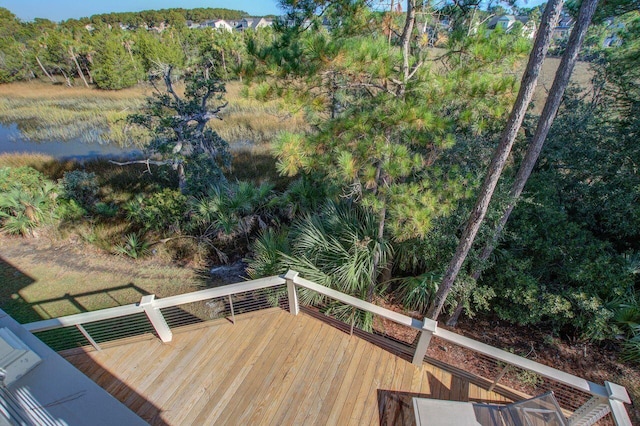 wooden terrace with a water view