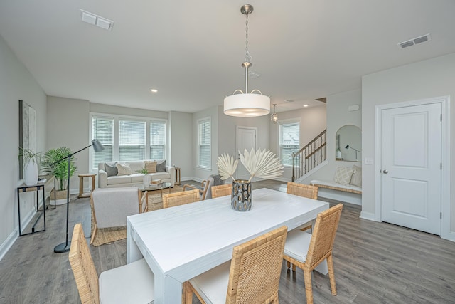 803 Lachicotte Creek Dr, Charleston, SC 29492 - dining area with visible vents, baseboards, wood finished floors, and stairway
