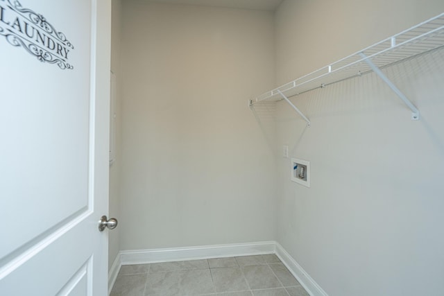 803 Lachicotte Creek Dr, Charleston, SC 29492 - laundry area featuring light tile patterned floors, baseboards, laundry area, and hookup for a washing machine