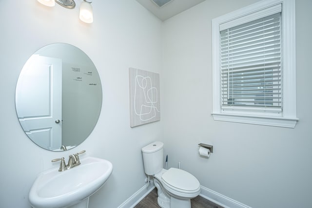 803 Lachicotte Creek Dr, Charleston, SC 29492 - half bath with a sink, baseboards, toilet, and wood finished floors