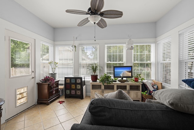 sunroom / solarium featuring tile patterned flooring
