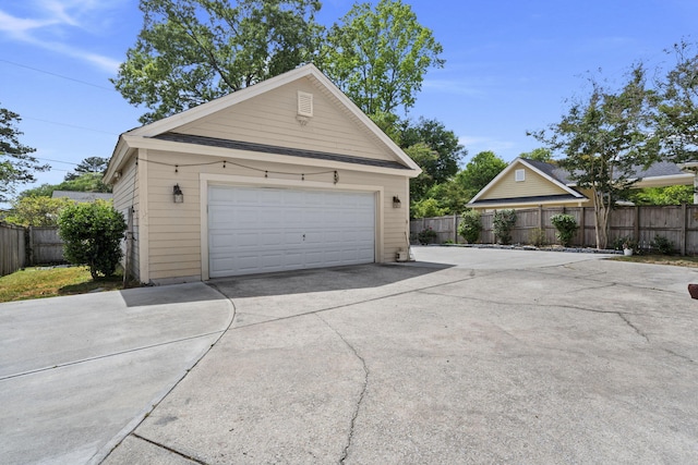 detached garage with fence