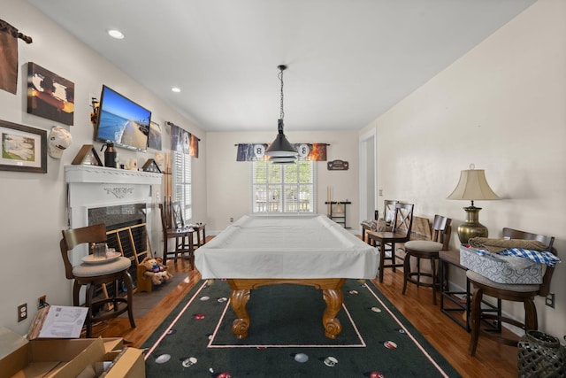 recreation room featuring a glass covered fireplace, billiards, recessed lighting, and wood finished floors