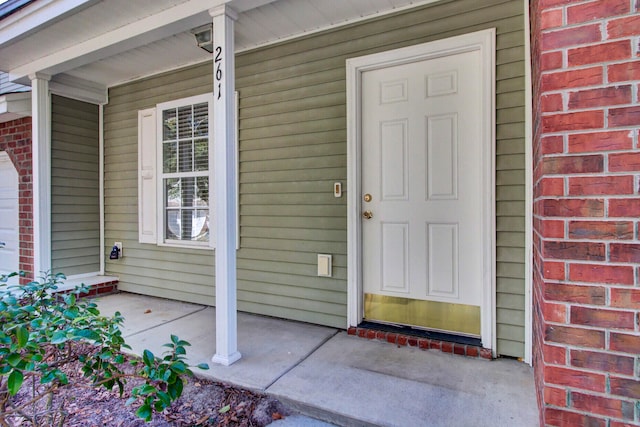 property entrance with a porch