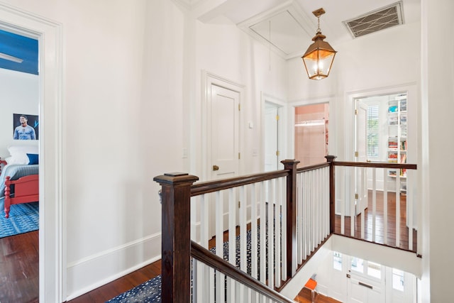 corridor featuring dark hardwood / wood-style floors