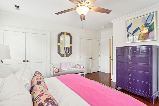 bedroom with ceiling fan, dark hardwood / wood-style flooring, and crown molding