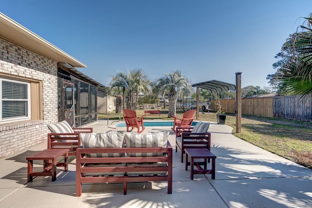 view of patio featuring outdoor lounge area, a fenced backyard, and a fenced in pool