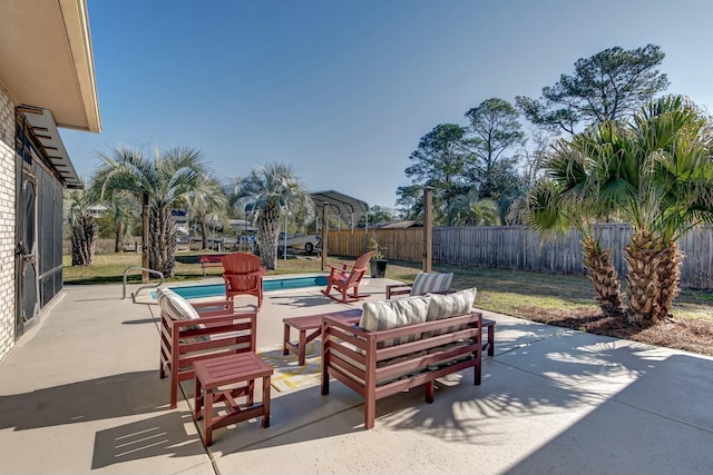 view of patio / terrace with a fenced in pool and a fenced backyard