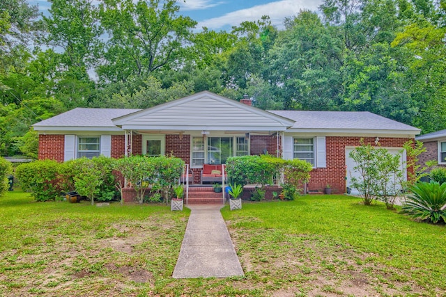 1430 Brian Rd, Charleston, SC 29407 - view of front of house with a porch, a front lawn, a chimney, and brick siding