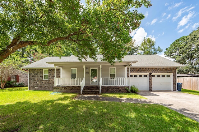 single story home with a front lawn, a porch, and a garage