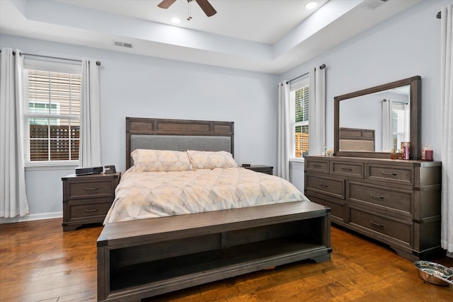 491 Foxbank Plantation Blvd, Moncks Corner, SC 29461 - bedroom with a tray ceiling, dark wood-style flooring, recessed lighting, and a ceiling fan