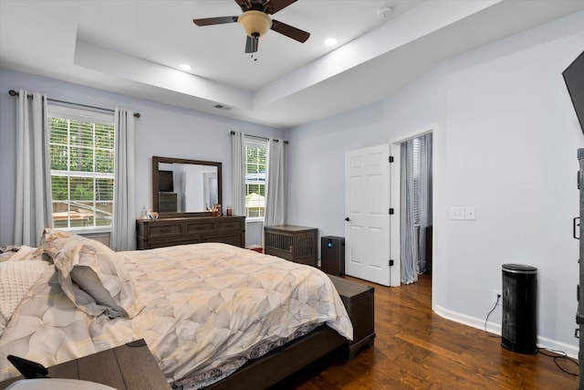 491 Foxbank Plantation Blvd, Moncks Corner, SC 29461 - bedroom with dark wood finished floors, a tray ceiling, ceiling fan, and recessed lighting