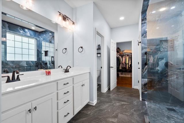491 Foxbank Plantation Blvd, Moncks Corner, SC 29461 - full bathroom featuring marble tiled floors, a marble finish shower, double vanity, and a spacious closet