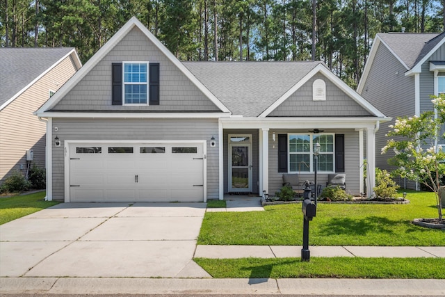 491 Foxbank Plantation Blvd, Moncks Corner, SC 29461 - view of front of property featuring concrete driveway, a front yard, a porch, a shingled roof, and a garage