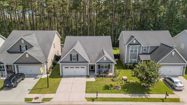 491 Foxbank Plantation Blvd, Moncks Corner, SC 29461 - view of front facade with driveway, a front lawn, and a porch