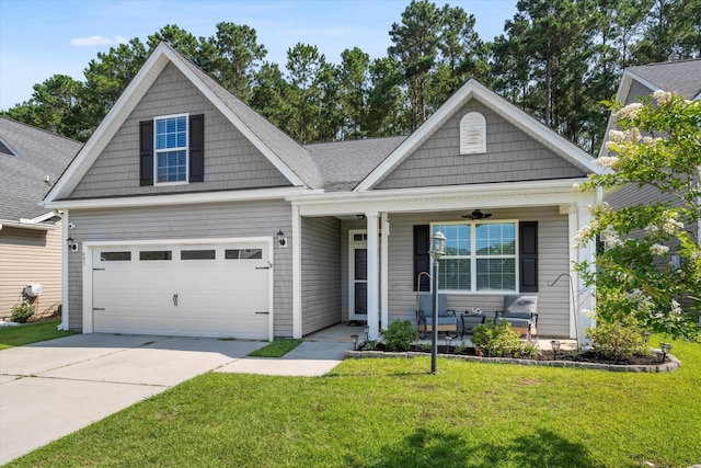 491 Foxbank Plantation Blvd, Moncks Corner, SC 29461 - view of front of home featuring a porch, a front lawn, driveway, and an attached garage