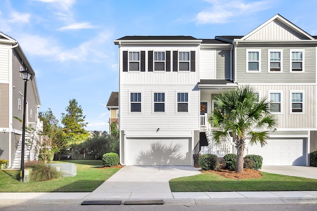 681 Mclernon Trce, Johns Island, SC 29455 - beach home with a garage, driveway, a front yard, and board and batten siding