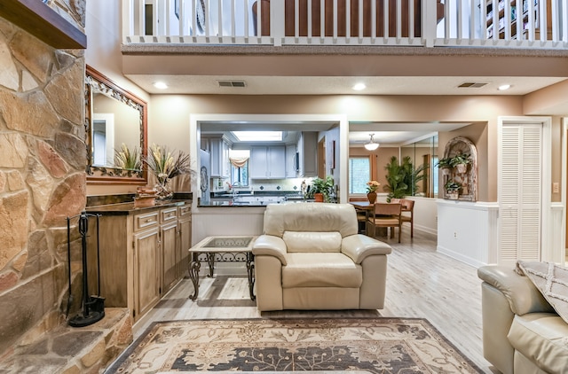 living room featuring light wood-type flooring