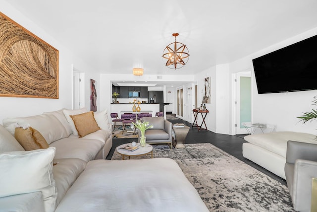 living room with a notable chandelier