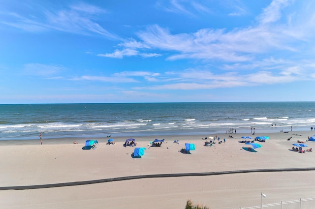 property view of water featuring a beach view