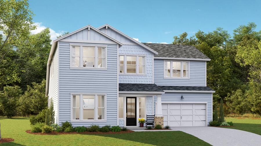 view of front facade featuring a garage and a front yard