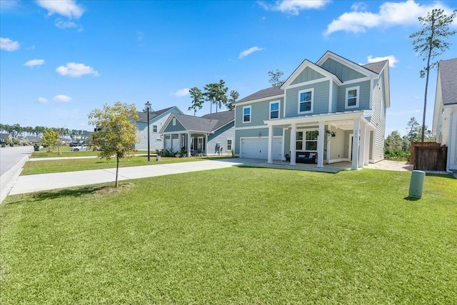 view of front of property featuring a porch, a garage, and a front yard