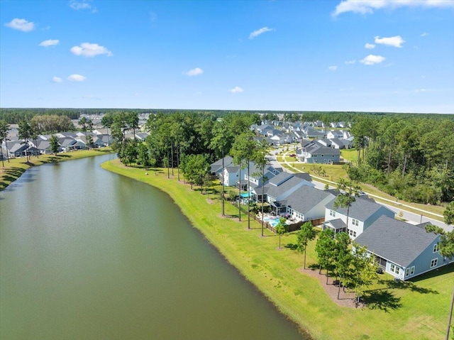 drone / aerial view with a water view