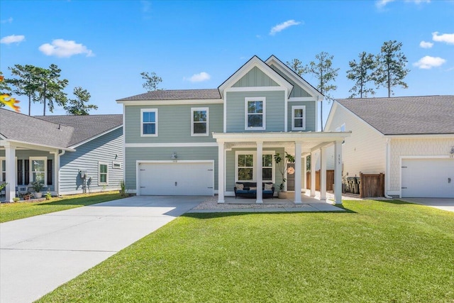 view of front of house with a garage and a front yard