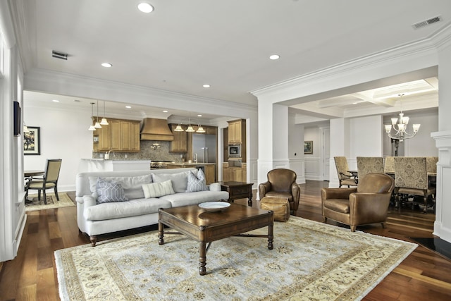 living room featuring beam ceiling, coffered ceiling, dark wood-type flooring, and a chandelier