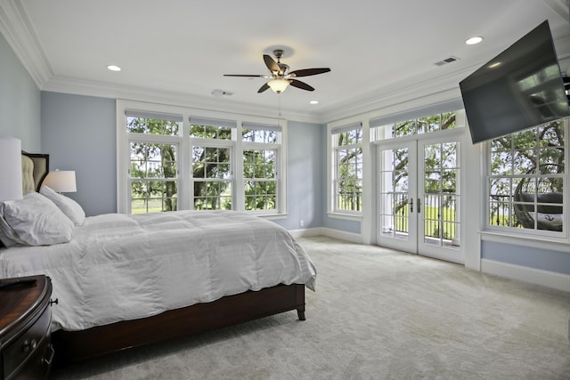 bedroom with french doors, crown molding, light carpet, access to outside, and ceiling fan