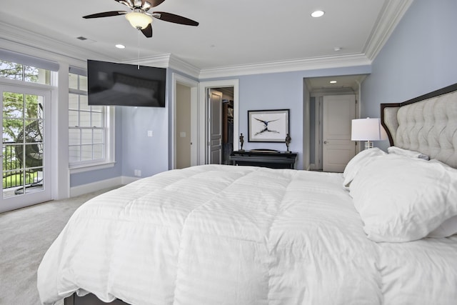 carpeted bedroom with crown molding, a spacious closet, access to exterior, and ceiling fan