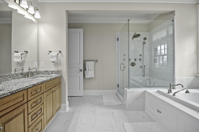 bathroom with vanity, crown molding, and independent shower and bath