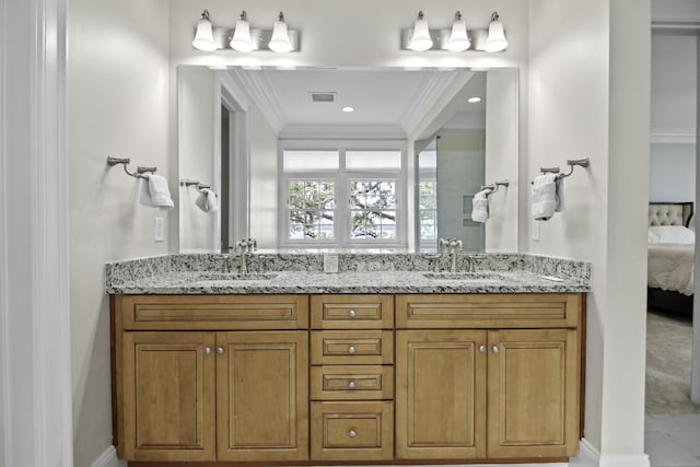 bathroom with vanity and crown molding