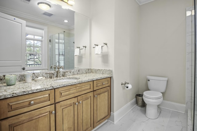 bathroom featuring ornamental molding, toilet, an enclosed shower, and vanity