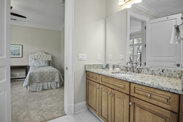 bathroom featuring tile patterned floors, ornamental molding, and vanity