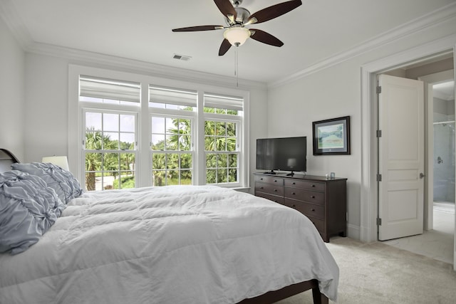 bedroom featuring ornamental molding, light carpet, and ceiling fan