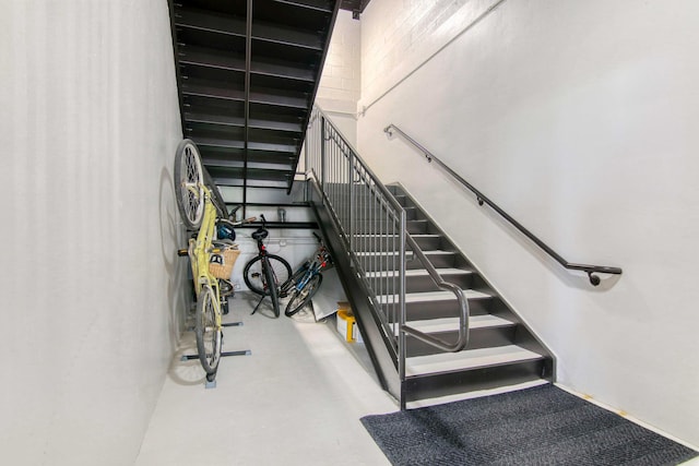 stairs with concrete floors