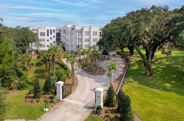 view of community with a lawn